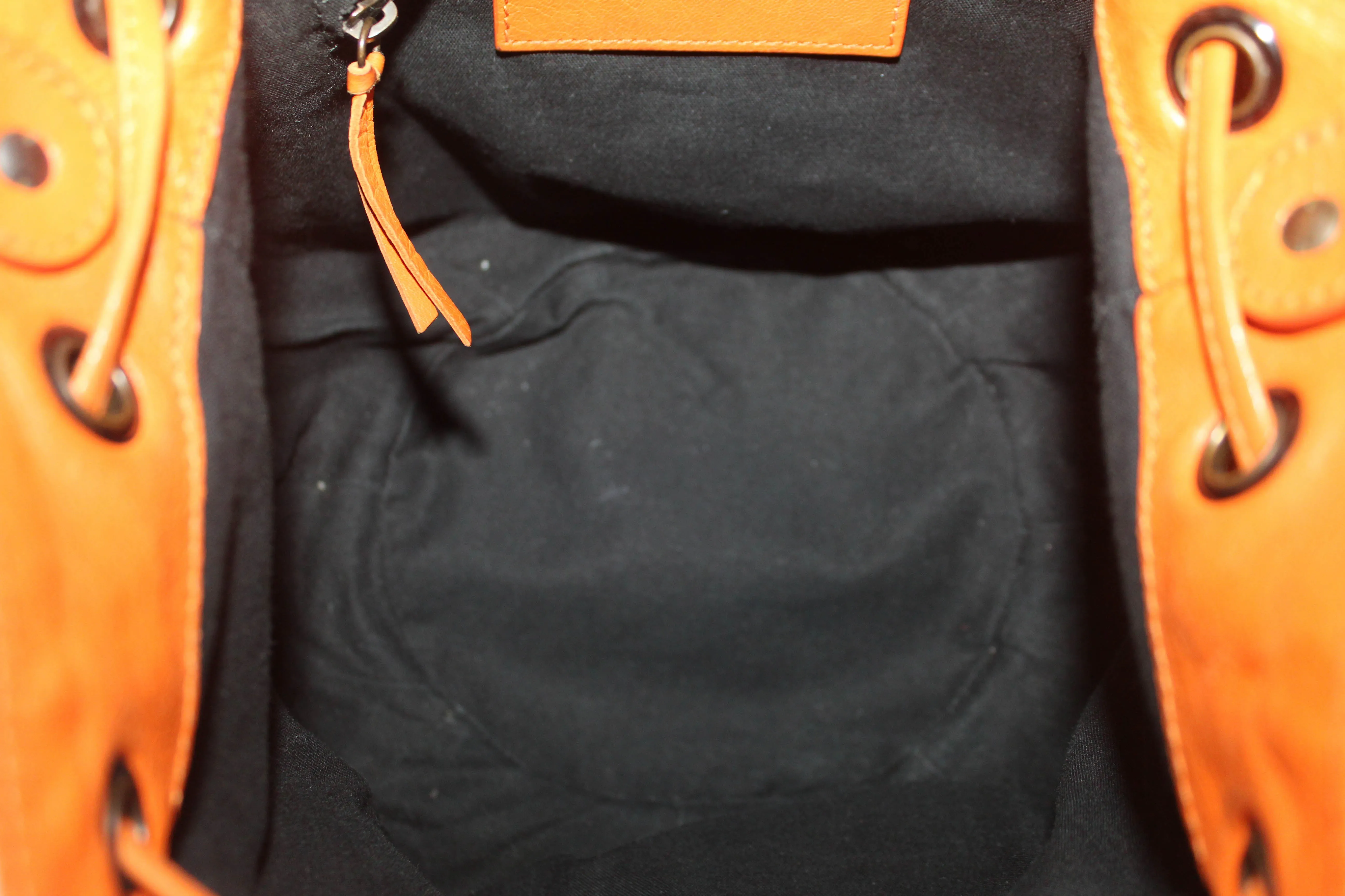 Authentic Balenciaga Orange Lambskin Leather Mini Pompon Bucket Crossbody
